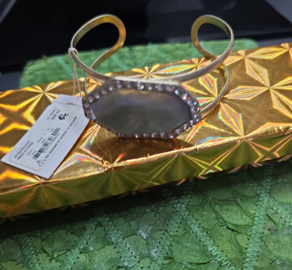 Macy's Gold Toned Cuff Bracelet with Gray Center Stone and Clear Crystals